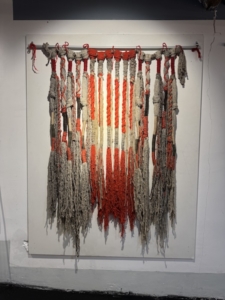 Artwork modeled on the historic Andean khipu (aka quipu), which used knots as a record-keeping system. This was seen in the Sulca Textile House Museum near Cusco.