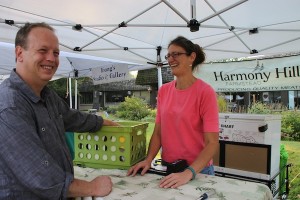 David Hunt and Michelle Asselin at farmers' market in Lake Placid