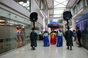 Royal Walk: Reenactors make their way down the corridors at Incheon International Airport.