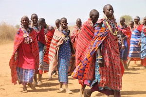 Maasai women, brightly attired and adorned with traditional beaded earrings and necklaces, were among villagers welcoming our group to their home near Amboseli National Park in southern Kenya.