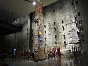 Foundation Hall, at bedrock level in the 9/11 Museum. The slurry wall, which survived the 9/11 destruction, is seen, along with the last steel beam to be removed from Ground Zero. Its removal marked the end of a nine-month recovery effort.