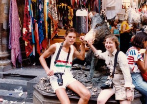 Marty and me, with the bronze fountain of a wild boar that gives this outdoor Florentine market its name, Porcellino. Photo by Edward Pyle.