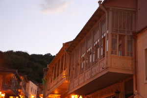 Balconies seen at dusk, a typical architectural detail on Sighnaghi houses.