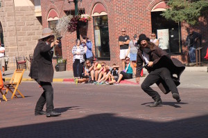 During a shootout reenactment in Deadwood, one of the participants goes down after having been “shot.”
