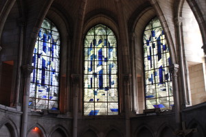 Modern stained-glass windows seen in St. Remi Basilica.