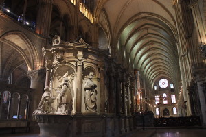 Tomb of St. Remi (St. Remigius), located in the St. Remi Basilica’s apse. The basilica’s long nave recedes in the background, at right.