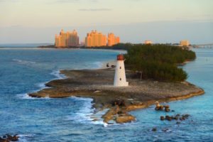 A Bahamian lighthouse, with the Atlantis Paradise Island resort in the background.