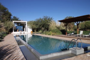 One of four swimming pools on the grounds at Explora Atacama.