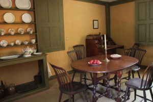 Dining room of the c. 1800 Rider-Wood House, one of many restored homes at Strawbery Banke. 