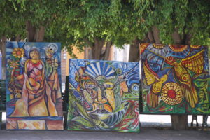 Paintings, presumably for sale, on display in the Ajijic town square.