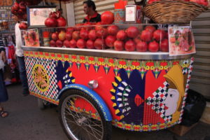 Brightly colored fruit stand seen along Corso Umberto I in Taormina.