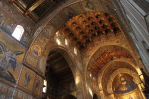 The Monreale Cathedral’s golden mosaic-covered apse plus details of the decorative ceiling over the choir.