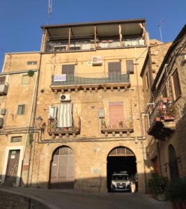 A difficult-to-navigate area in Piazza Armerina. The car seen above is driving through the narrow passage that we remember well. A woman stepped out of her house to help us maneuver our vehicle in order to enter this passage without causing damage.