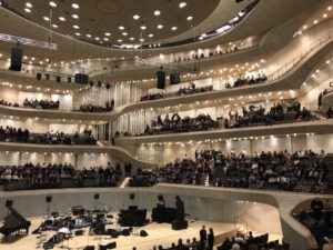 The 2,100-seat Grand Hall inside the Elbphilharmonie, featuring the so-called “vineyard”-style seating arrangement. The vertical lines at left center are the pipes of the organ, which sits among the seats on several levels.