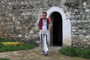 One of our hosts, in traditional Kosovar garb, at the entry to the 200-year-old Mazrekaj Kulla. The home was restored and fitted out for tourism and now appears as a housing option at Airbnb.
