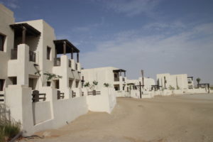 Traditional Arab architectural styles seen in the design of the new Jumeirah al Wathba Resort and Spa in the Abu Dhabi desert. View above is on the resort’s periphery; view below is amid the resort’s villas.