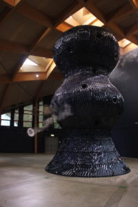 Inside a building called Invisible Worlds, a huge ceramic monument to cyanobacteria, a tiny bacteria that gave us oxygen many eons ago. The ceramic piece, called “Blue,” is designed to replicate the processes that create oxygen.