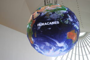 Overhead globe in the Museum of Tomorrow. Designed to illustrate data on weather and atmospheric conditions, the above version illustrates where hurricanes were active on the day the photo was taken.