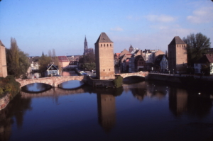 Fourteenth century towers, the remains of old ramparts, overlook Strasbourg’s so-called covered bridges and the Ill River. The bridges lost their roofs in the 18th century.