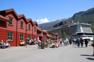 The tourist hub at Flam, with shops to the left and a cruise ship that can accommodate 6,300.