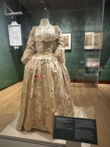 Seen in “The Occupied City” exhibit, a gown worn at an inauguration ball celebrating George Washington’s first presidential inauguration in 1789.