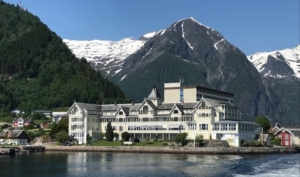 Above and below, the Kviknes Hotel recedes as we sail away, revealing just how dramatic the setting is for the property and for the town of Balestrand.