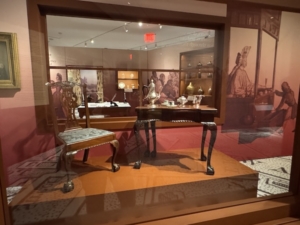 A simulated coffeehouse meant to imitate one type of establishment in Revolutionary Era New York City where locals would gather to do business and debate the future.