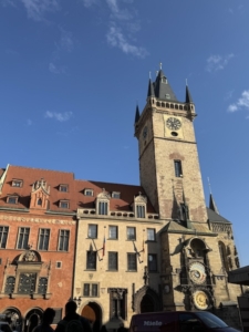 Above, a portion of Prague’s Old Town Square. The clock in the tower at right is perhaps the best known feature of the large square. Below, a closer look at the astronomical clock.