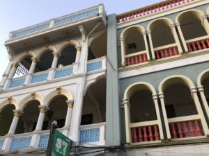 Above and below, restored Sino-Portuguese houses that overlook Phuket’s night market on Thalang Road, a walking street.