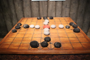 Model for a Viking board game called hnefatafl, a game that seems to have enjoyed the same kind of status that chess does today.