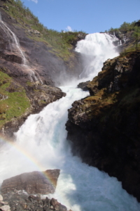 The Kjosfossen waterfall, seen and heard at close range. The rushing waters made a lot of noise, competing with manmade music.